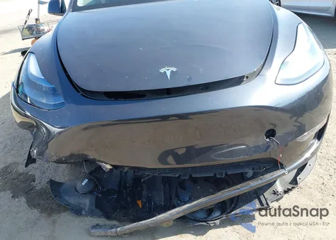 2025 Tesla Model Y Long Range Dual Motor All-Wheel Drive from USA, damaged, VIN 7SAYGDED9SF312634